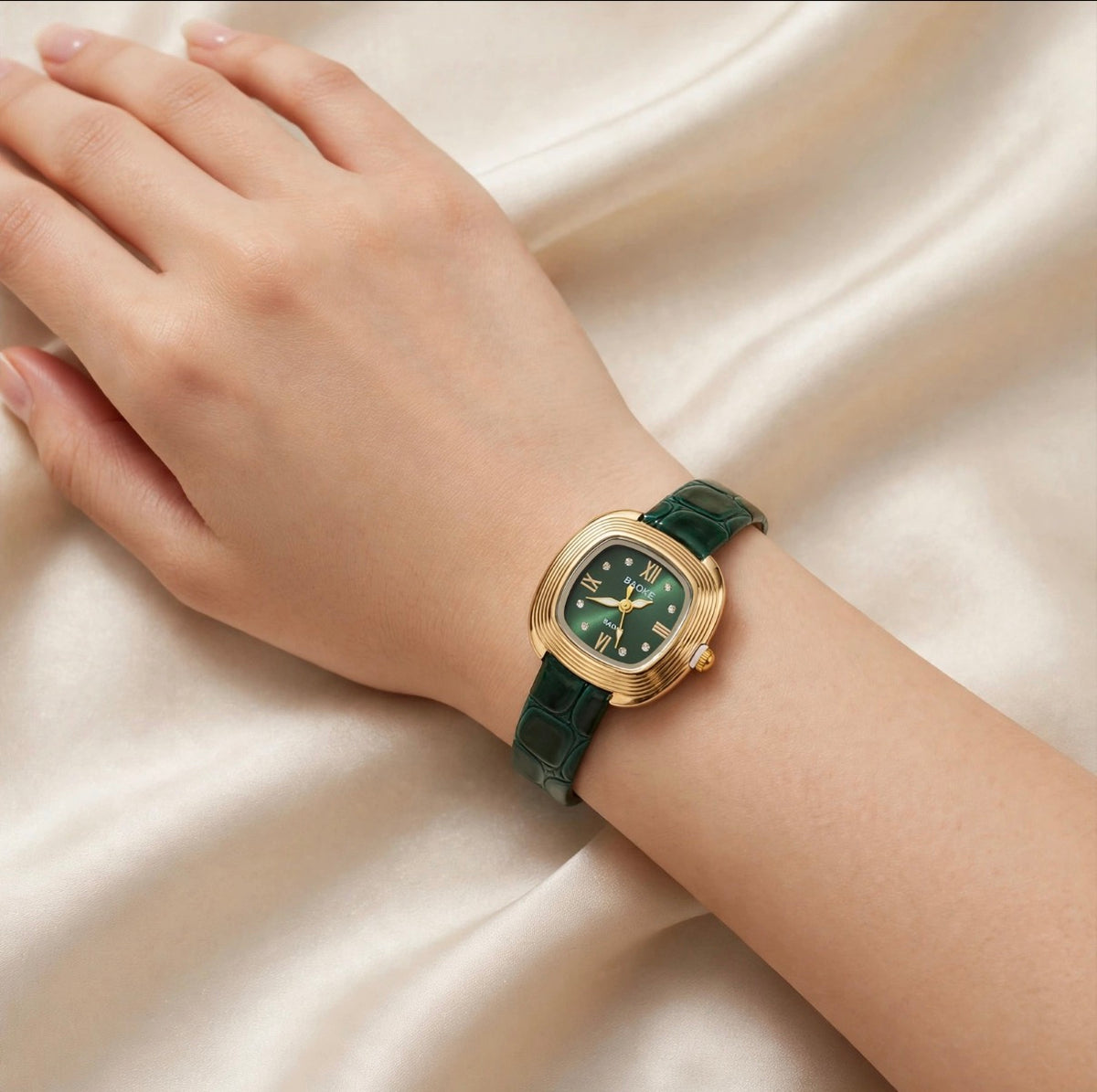 Royale watch with green leather strap worn on wrist
