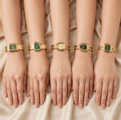 Aly women’s vintage gold-tone watches worn on wrists